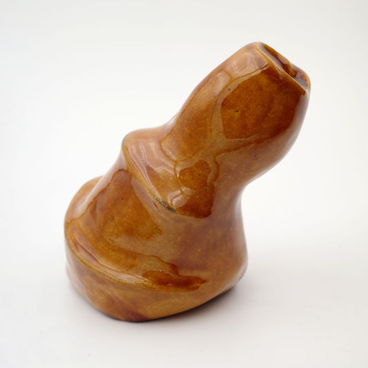 Anthropomorphe Form goldbraun und glänzend