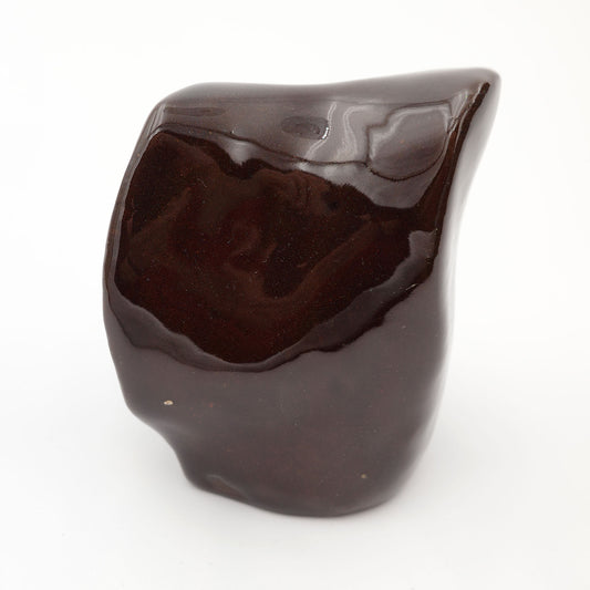 Anthropomorphe Form dunkler Glanz